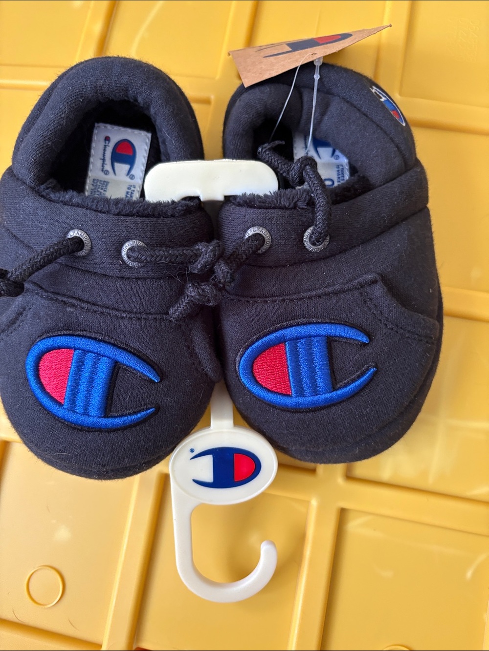 Champion Baby Black Slip-On Shoes with Blue & Red Logo